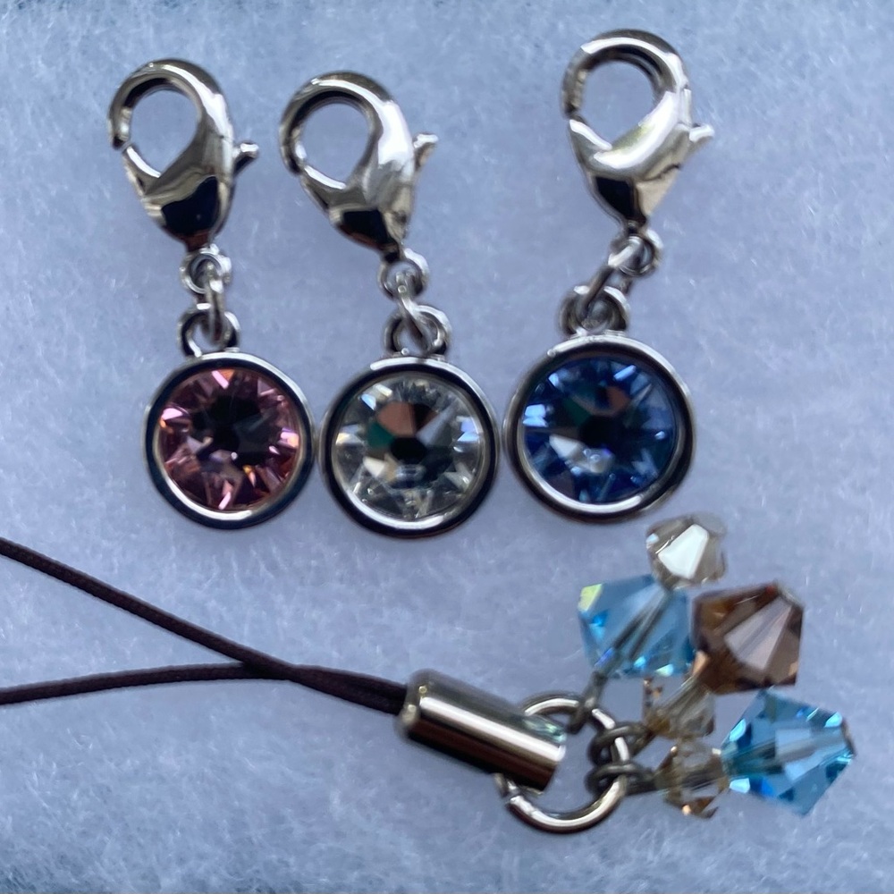 Touchstone Crystal charms.